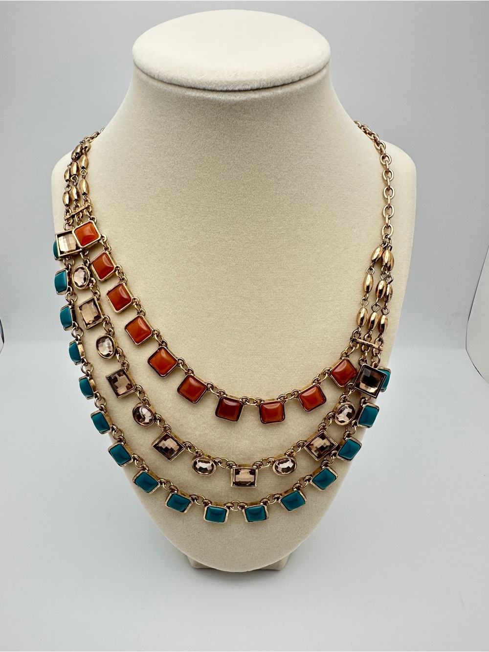 Layered Gold-Tone Necklace with Turquoise and Coral colored Stones